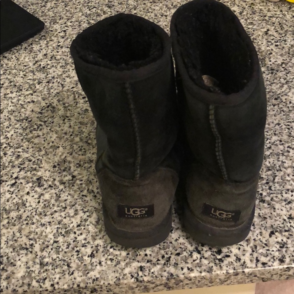 Black Uggs Size 8- hole in left boot